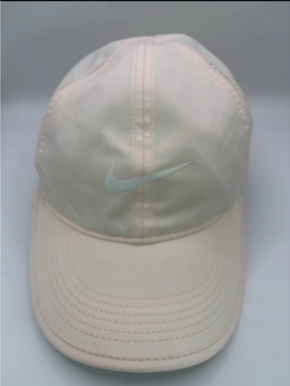 Nike Featherlight DriFIT adjustable baseball cap in a beautiful light blush pink